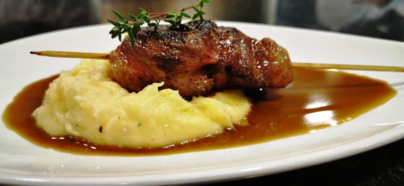 Magret de pato con aligot